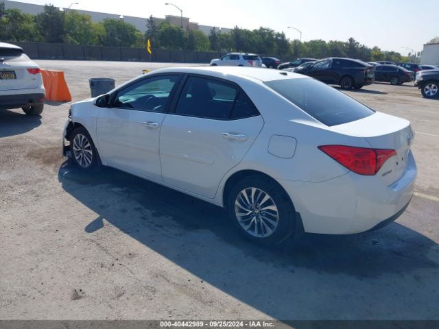 5YFBURHE0KP868901 Toyota Corolla Xle