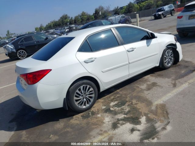 5YFBURHE0KP868901 Toyota Corolla Xle