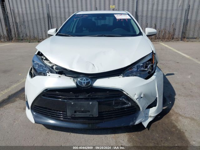 5YFBURHE0KP868901 Toyota Corolla Xle