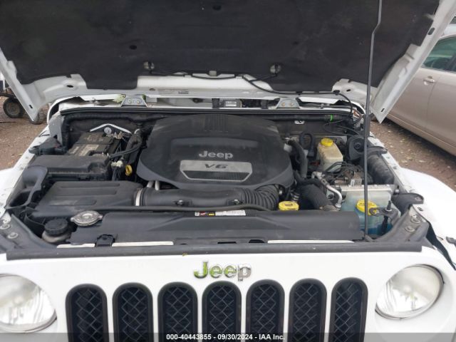 1C4BJWEG2EL138756 Jeep Wrangler Unlimited Sahara