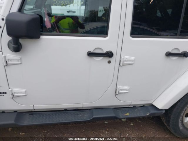 1C4BJWEG2EL138756 Jeep Wrangler Unlimited Sahara