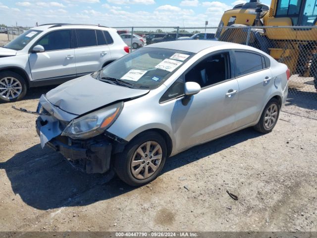 KNADM4A39E6377904 KIA RIO LX