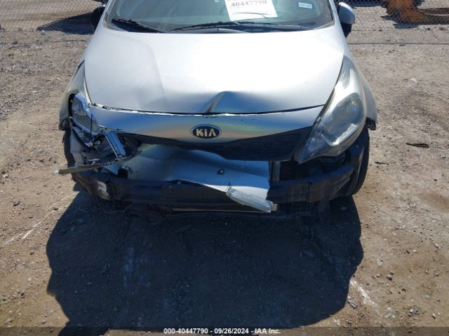 KNADM4A39E6377904 KIA RIO LX