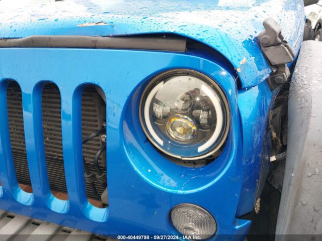 1C4BJWDG8GL305187 Jeep Wrangler Unlimited Sport