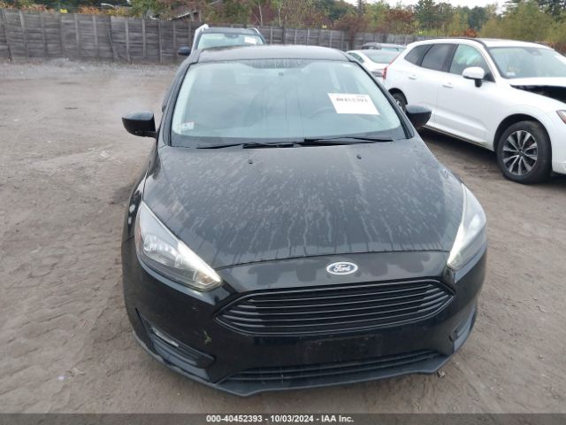 1FADP3FE7JL213759 Ford FOCUS SE