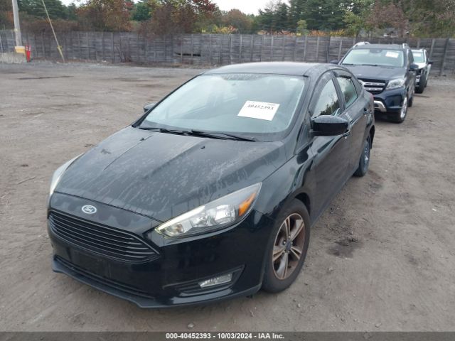 1FADP3FE7JL213759 Ford FOCUS SE