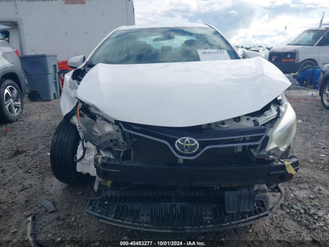 5YFBURHE5GP390594 Toyota COROLLA LE