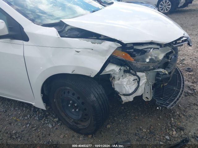 5YFBURHE5GP390594 Toyota COROLLA LE