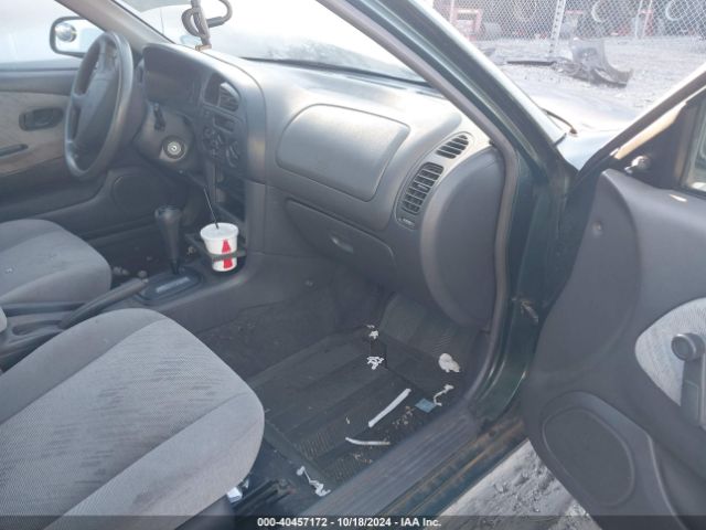 1999 MITSUBISHI MIRAGE JA3AY26A0XU017889 Photo 4