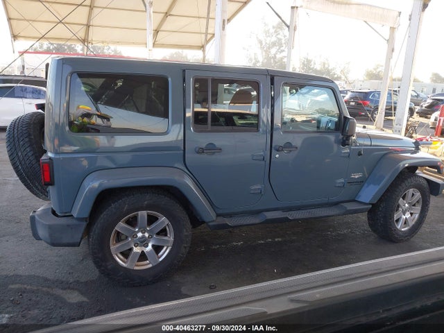1C4BJWEG0EL128887 Jeep Wrangler Unlimited Sahara