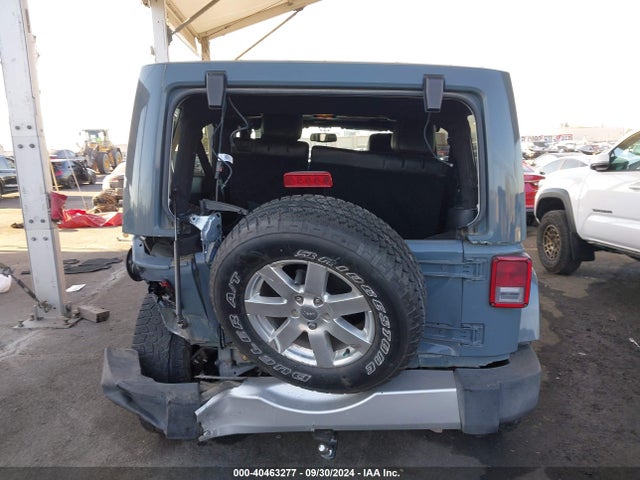 1C4BJWEG0EL128887 Jeep Wrangler Unlimited Sahara