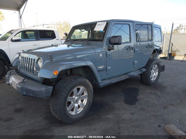 1C4BJWEG0EL128887 Jeep Wrangler Unlimited Sahara