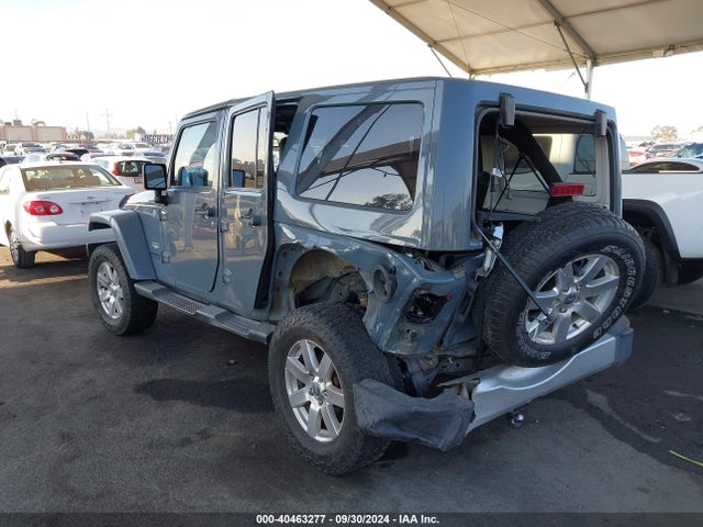 1C4BJWEG0EL128887 Jeep Wrangler Unlimited Sahara
