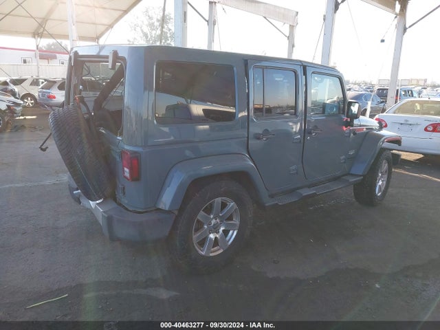 1C4BJWEG0EL128887 Jeep Wrangler Unlimited Sahara