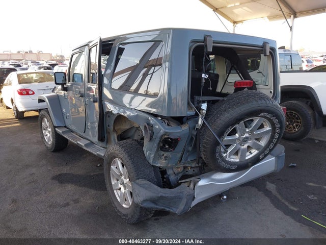 1C4BJWEG0EL128887 Jeep Wrangler Unlimited Sahara