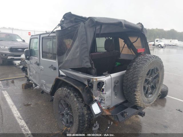 1C4BJWDG9EL141946 Jeep Wrangler Unlimited Sport