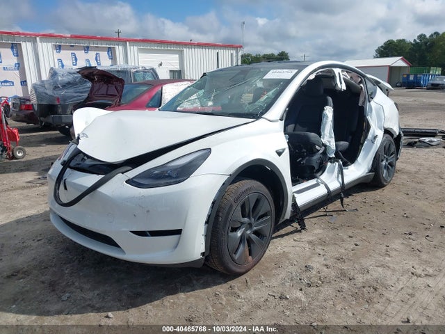 2024 TESLA MODEL Y 7SAYGDED4RF113050 Photo 1