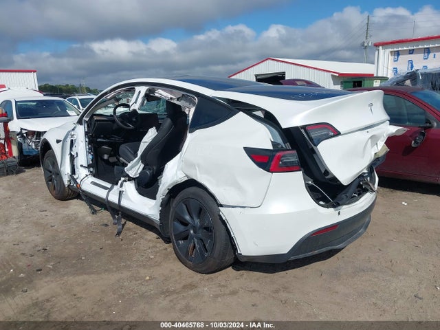 2024 TESLA MODEL Y 7SAYGDED4RF113050 Photo 2