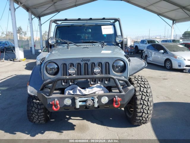 1C4AJWAG4EL311937 Jeep Wrangler Sport
