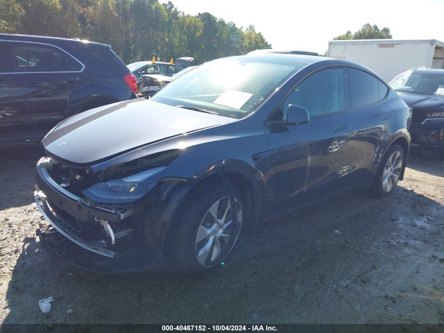 2023 TESLA MODEL Y 7SAYGDEEXPF770974 Photo 1