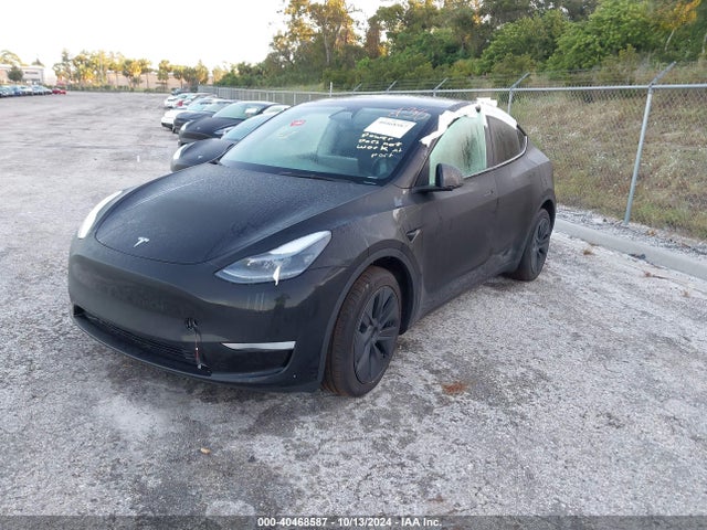 2024 TESLA MODEL Y 7SAYGDEE9RA292188 Photo 1