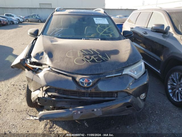JTMRJREVXJD161494 Toyota Rav4 Hybrid Xle