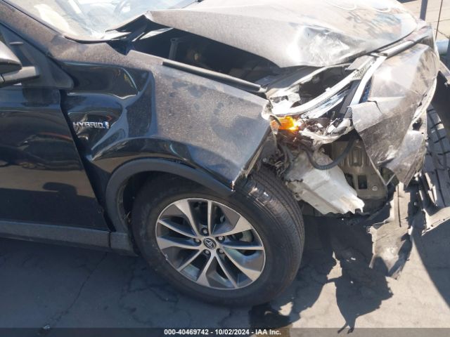 JTMRJREVXJD161494 Toyota Rav4 Hybrid Xle