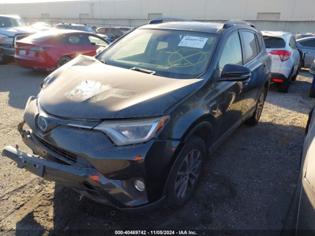 JTMRJREVXJD161494 Toyota Rav4 Hybrid Xle