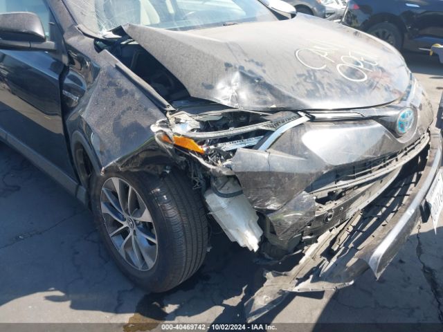 JTMRJREVXJD161494 Toyota Rav4 Hybrid Xle