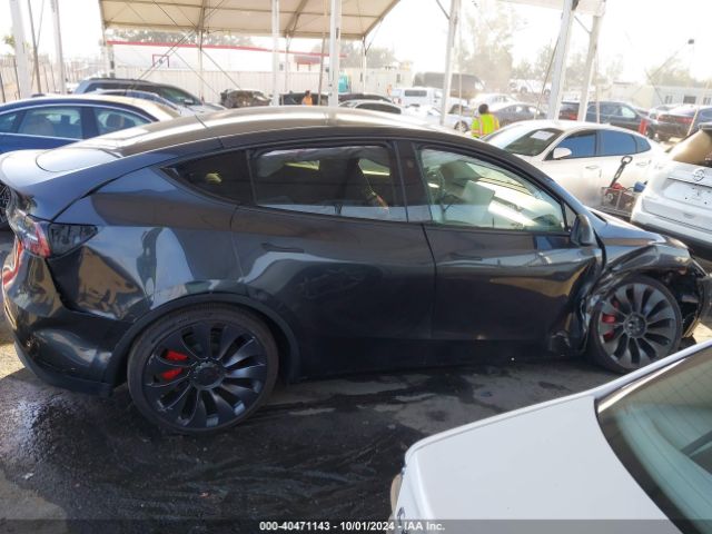 7SAYGDEF7RF104408 Tesla Model Y Performance Dual Motor All-wheel Drive