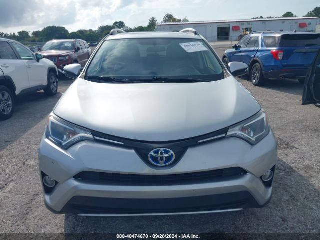 JTMRJREV7GD022304 Toyota Rav4 Hybrid Xle
