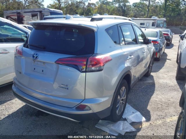 JTMRJREV7GD022304 Toyota Rav4 Hybrid Xle