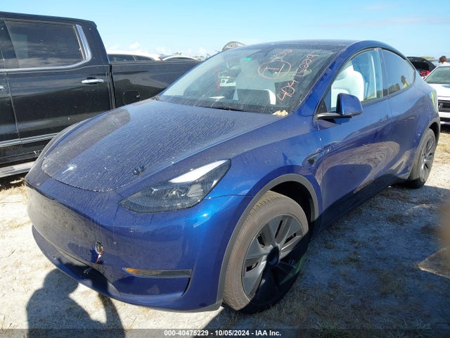 2024 TESLA MODEL Y 7SAYGDED4RF100265 Photo 1
