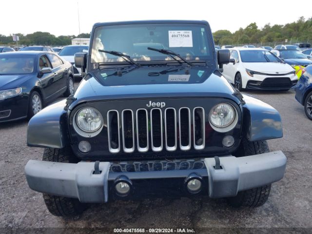 1C4AJWBG8GL183140 Jeep Wrangler Sahara