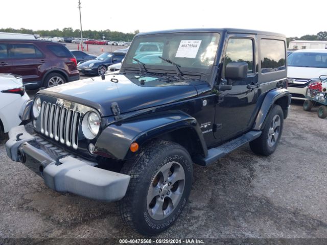 1C4AJWBG8GL183140 Jeep Wrangler Sahara