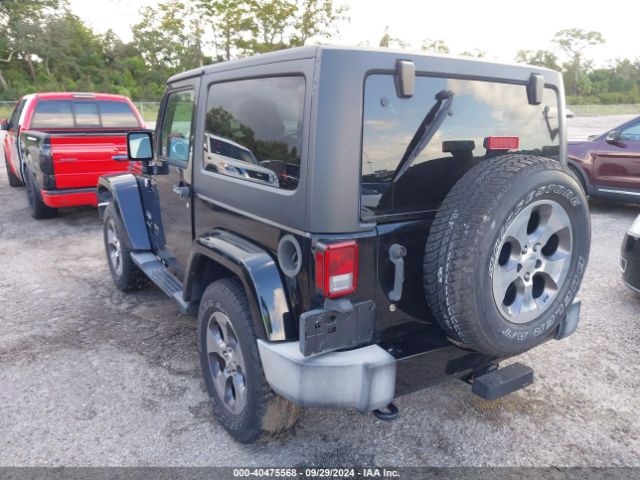 1C4AJWBG8GL183140 Jeep Wrangler Sahara