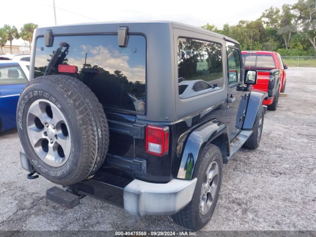 1C4AJWBG8GL183140 Jeep Wrangler Sahara