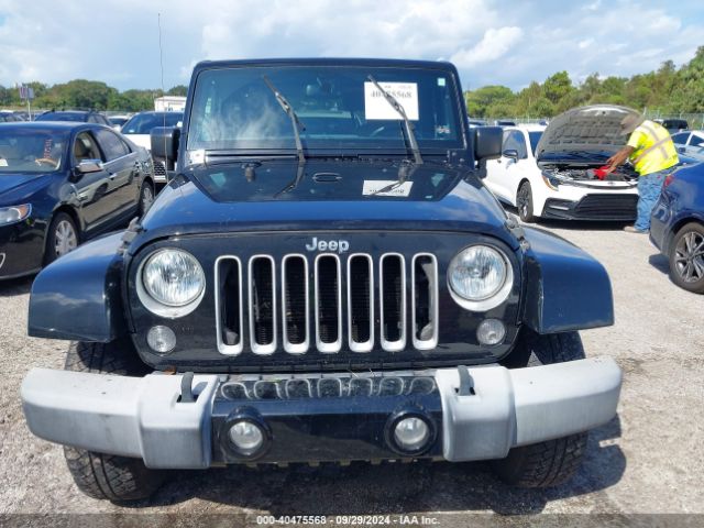 1C4AJWBG8GL183140 Jeep Wrangler Sahara