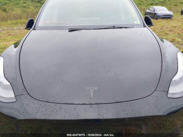 2023 TESLA MODEL Y 7SAYGDEE8PF875724 Photo 9