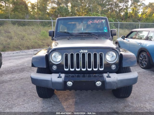 1C4AJWBG2GL148657 Jeep Wrangler Sahara
