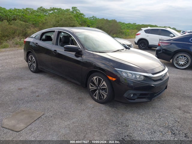 40477627 :رقم المزاد ، 19XFC1F77HE004769 vin ، 2017 Honda Civic Ex-l مزاد بيع
