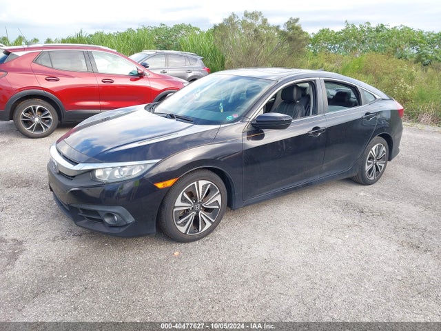 40477627 :رقم المزاد ، 19XFC1F77HE004769 vin ، 2017 Honda Civic Ex-l مزاد بيع