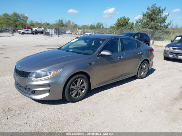 5XXGT4L14GG042911 KIA Optima Lx Turbo