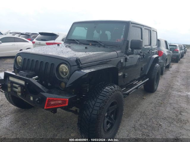 1C4HJWEG2EL292801 Jeep Wrangler Unlimited Sahara