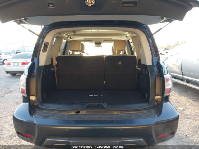 JN8AY2ND4KX008198 Nissan Armada Sl