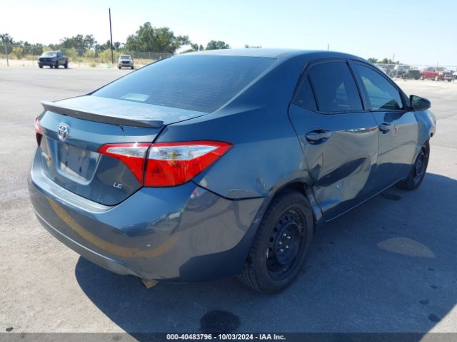 5YFBURHE9EP000299 Toyota Corolla Le Plus