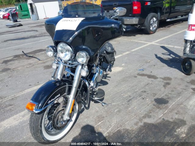 2015 HARLEY-DAVIDSON FLSTC 1HD1BWV1XFB025891 Photo 1