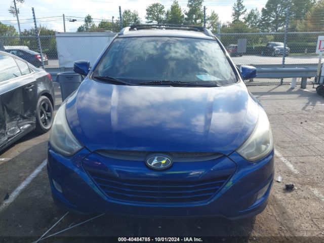 KM8JU3AGXEU931235 Hyundai TUCSON SE