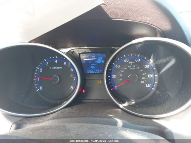 KM8JU3AGXEU931235 Hyundai TUCSON SE