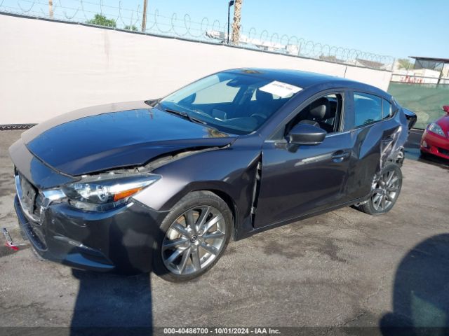 3MZBN1V34JM229876 Mazda Mazda3 Touring